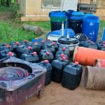 NDLEA officers inspecting recovered laboratory equipment; use an official NDLEA image where reuse is permitted.